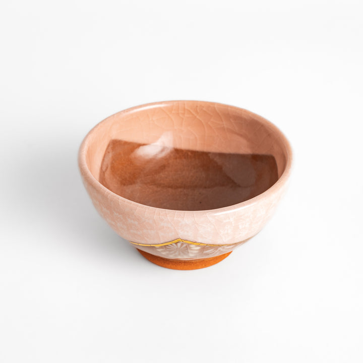 Authentic rice bowl, showcasing traditional Japanese artistry with a meticulously hand-painted, colorful floral motif.