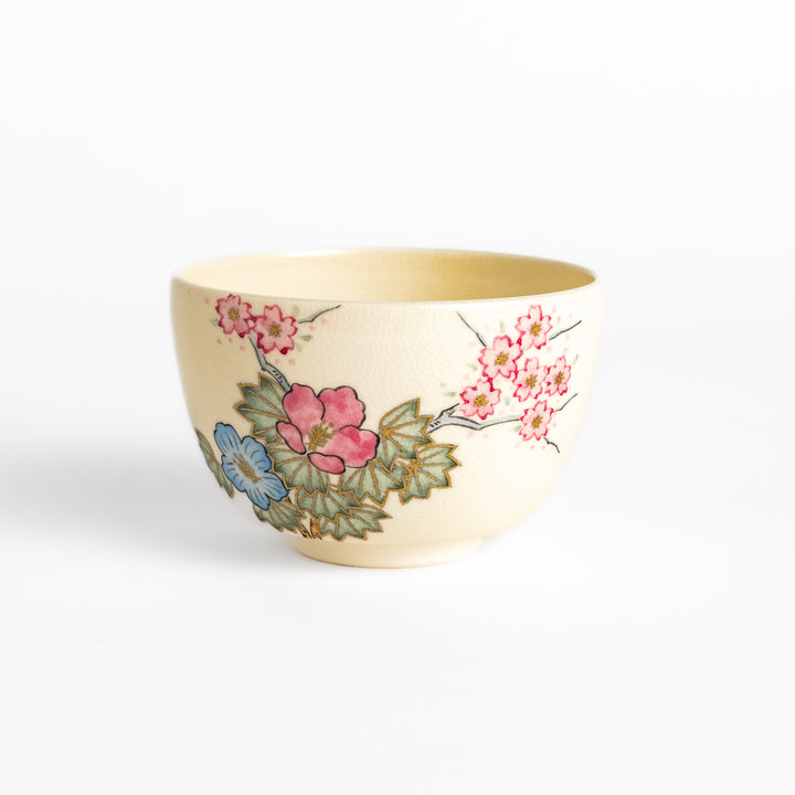 Handcrafted Matcha bowl with a pink and white floral design, ideal for enjoying a traditional Japanese tea ceremony.