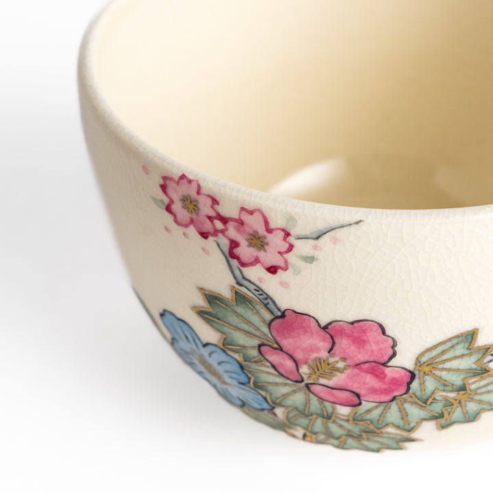 Handcrafted Matcha bowl with a pink and white floral design, ideal for enjoying a traditional Japanese tea ceremony.