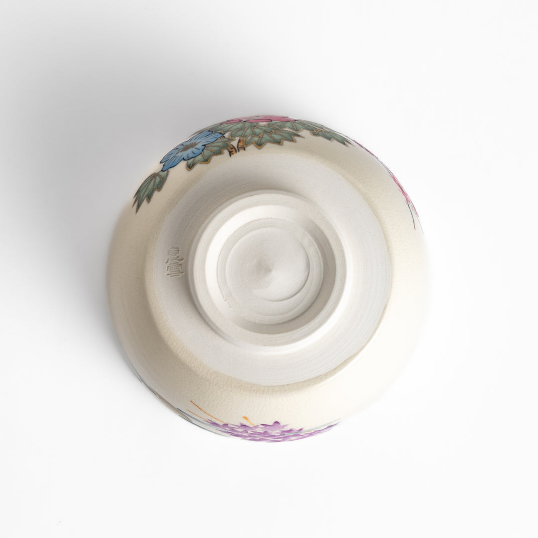 Handcrafted Matcha bowl with a pink and white floral design, ideal for enjoying a traditional Japanese tea ceremony.