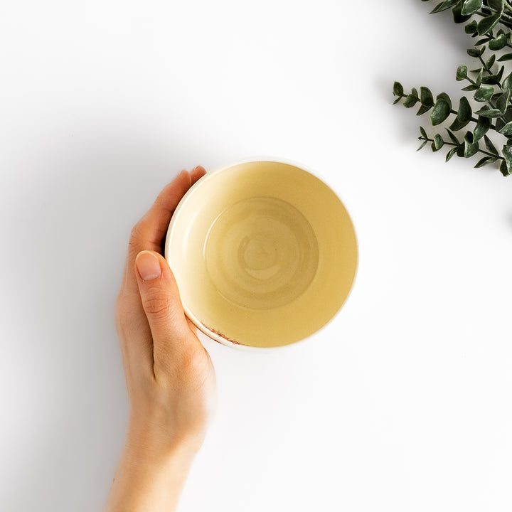 Handcrafted Matcha bowl with a pink and white floral design, ideal for enjoying a traditional Japanese tea ceremony.