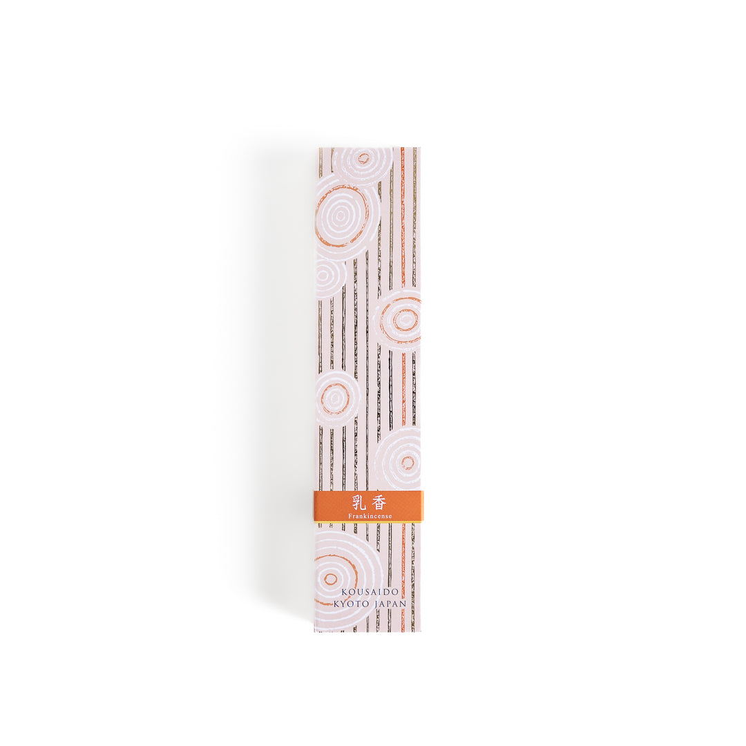 Frankincense Resin Incense in a light wooden box with earthy brown sticks, elegantly packaged in a soft beige design featuring white circular patterns, evoking a warm and spiritually uplifting aroma.