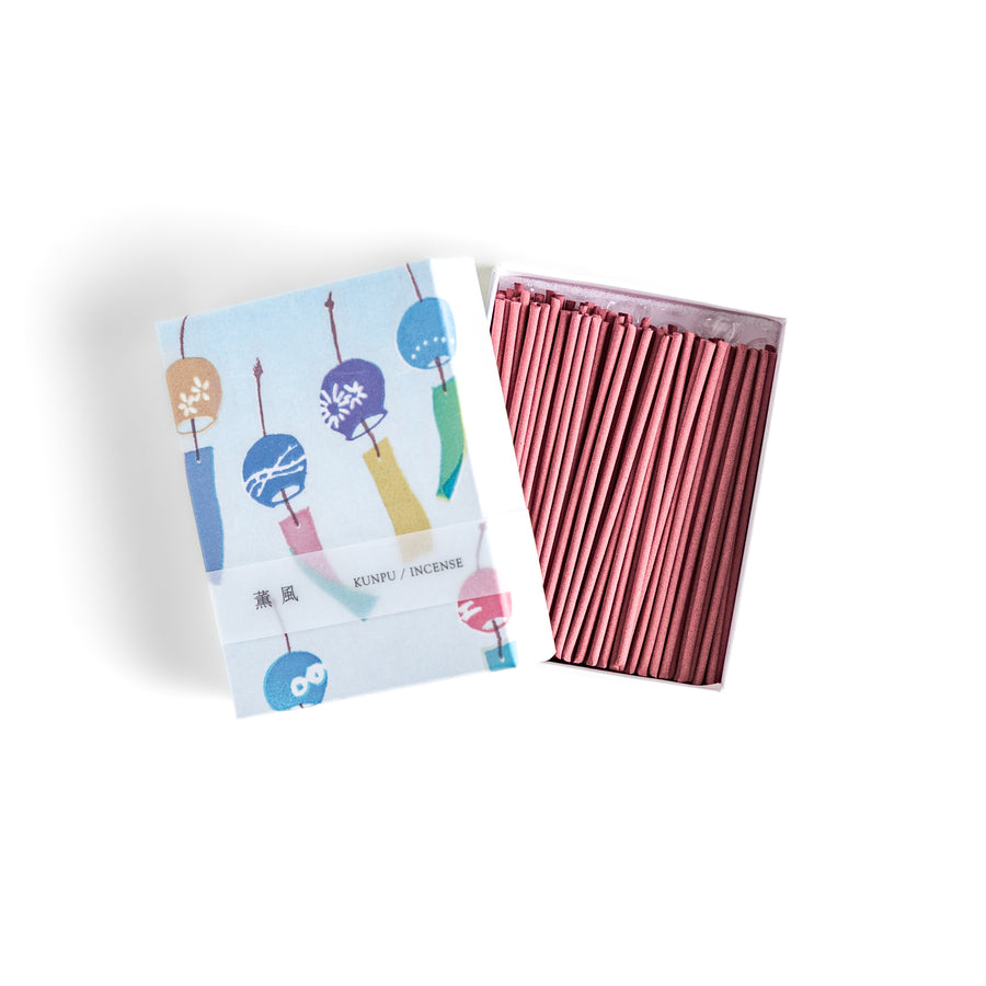 Incense featuring soft pink sticks in a box decorated with colorful Japanese wind chimes, evoking a light and refreshing fragrance reminiscent of a gentle summer breeze.