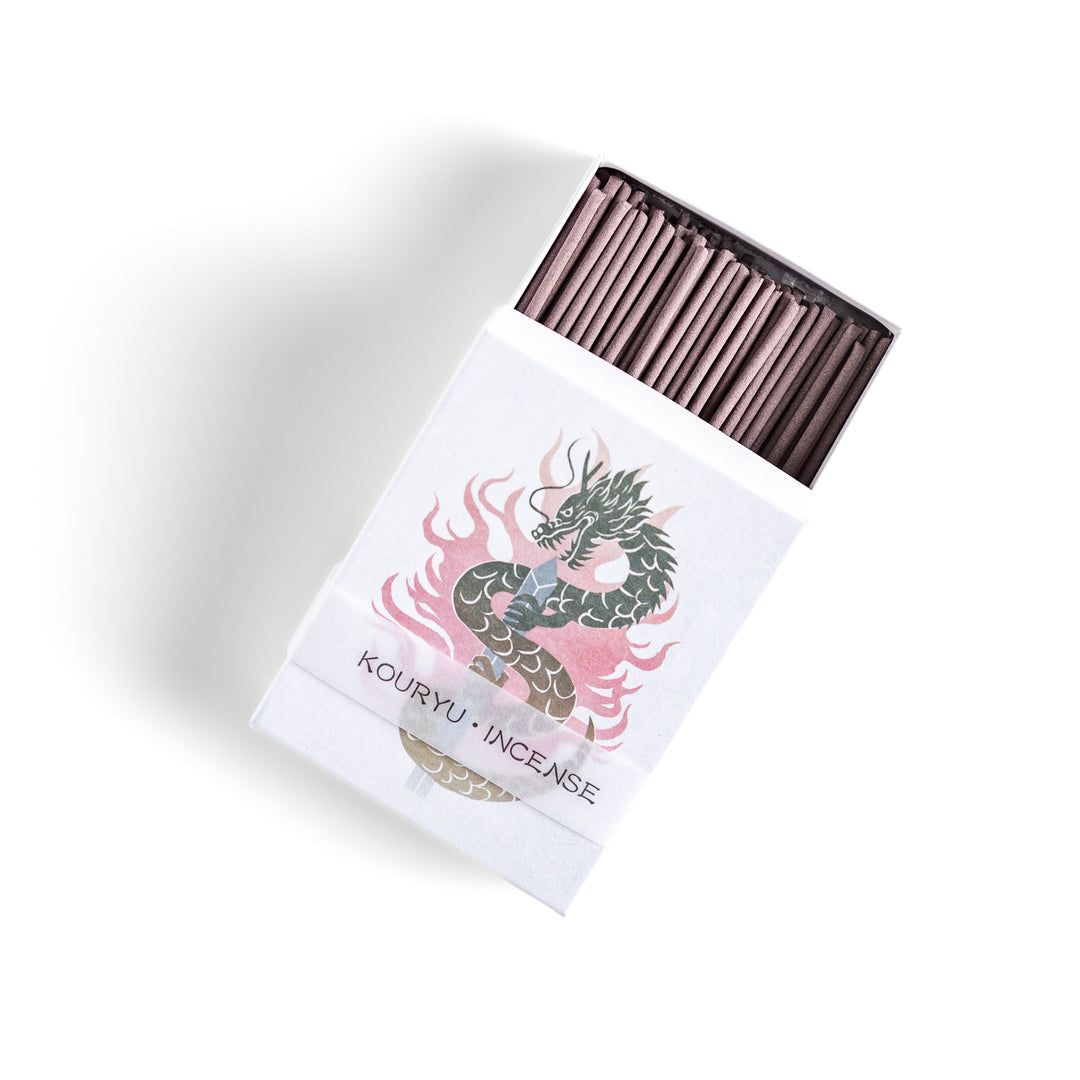 Dragon-themed incense featuring a striking illustration of a coiling dragon with fiery accents, offering a bold and aromatic experience in every stick.