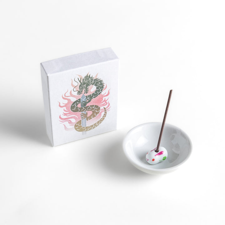 Dragon-themed incense featuring a striking illustration of a coiling dragon with fiery accents, offering a bold and aromatic experience in every stick.