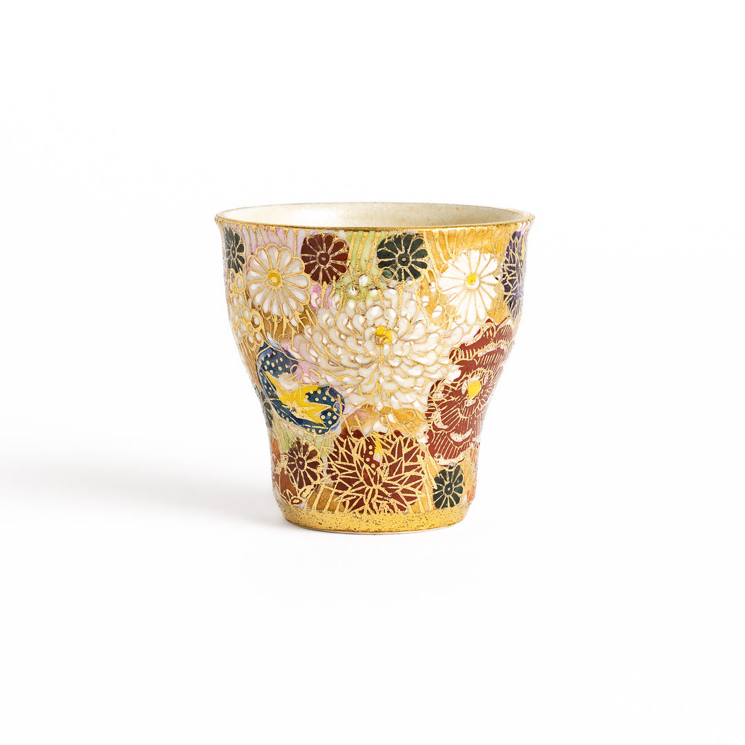 Elegant sake cup with a vibrant floral pattern in gold and pastel colors, perfect for savoring the delicate flavors of sake in style.