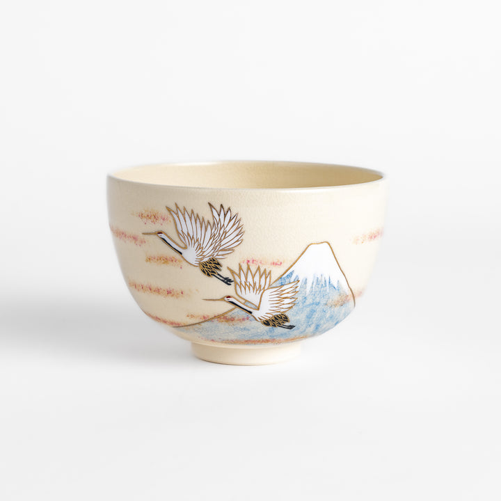 Elegant Matcha Bowl featuring a scenic design of Mount Fuji and flying cranes, accented with gold details for a luxurious tea experience.