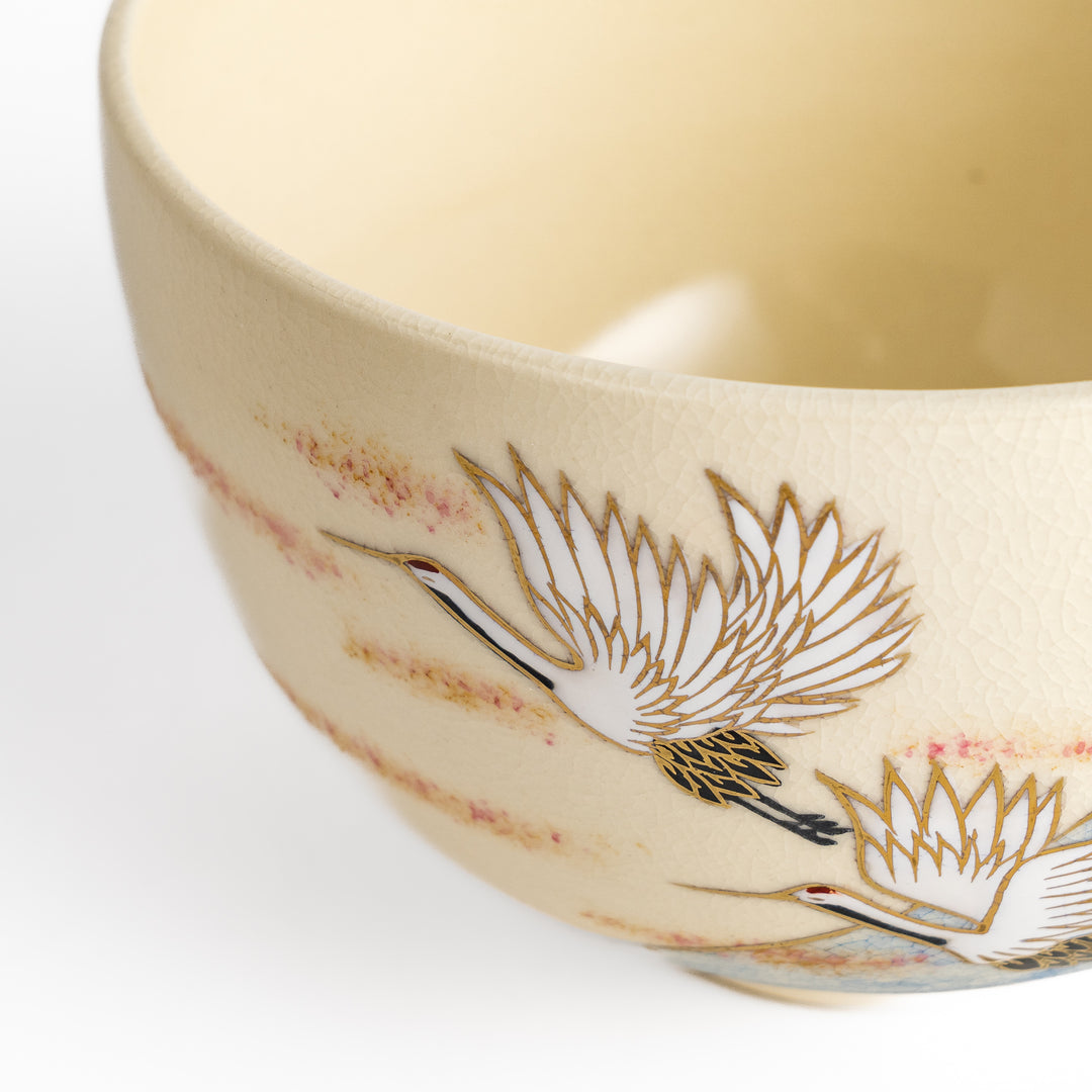 Elegant Matcha Bowl featuring a scenic design of Mount Fuji and flying cranes, accented with gold details for a luxurious tea experience.