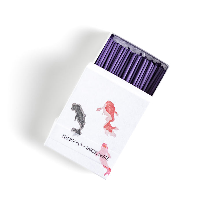 Incense featuring deep purple sticks in a box adorned with an elegant goldfish design, offering a tranquil and refreshing fragrance inspired by summer waters.