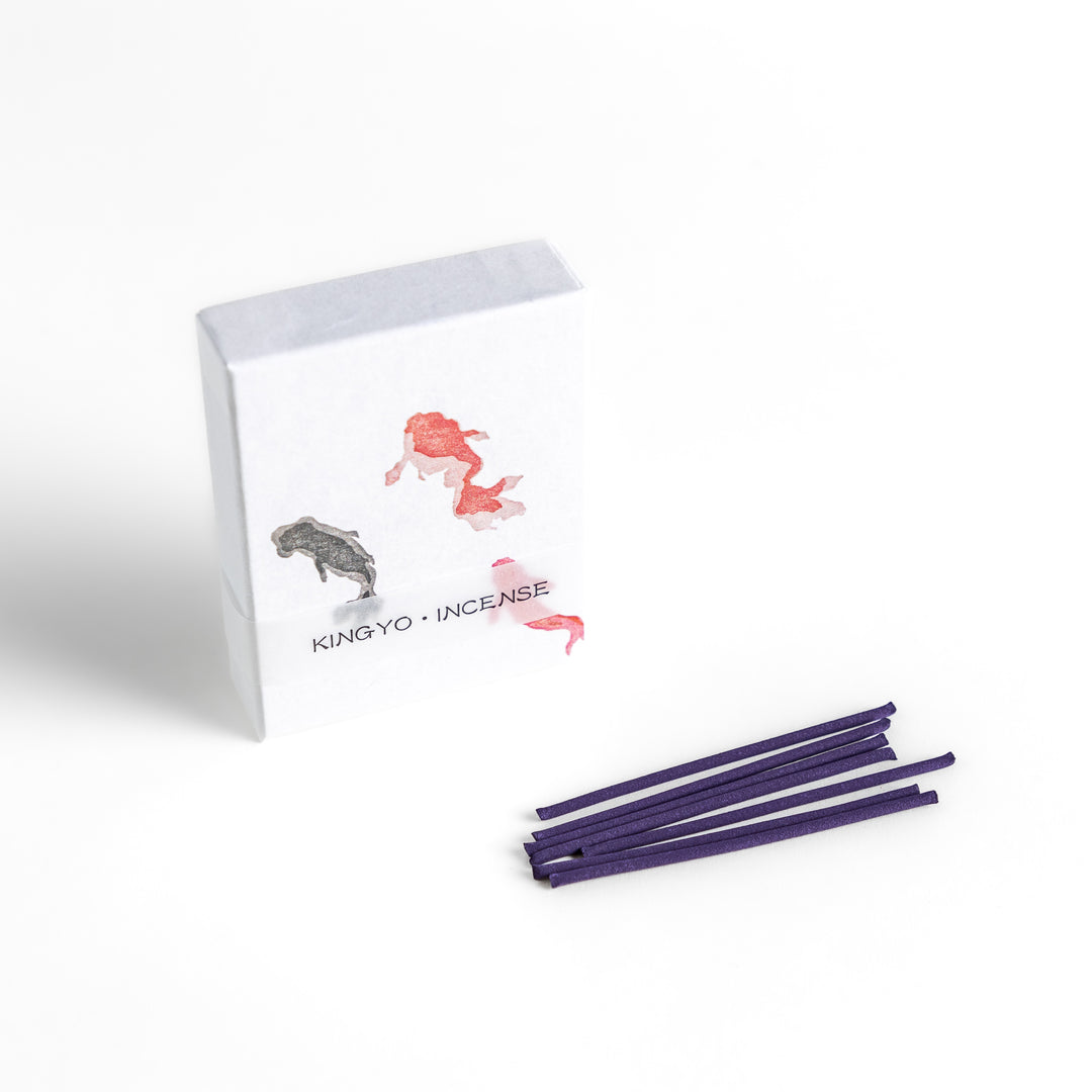 Incense featuring deep purple sticks in a box adorned with an elegant goldfish design, offering a tranquil and refreshing fragrance inspired by summer waters.