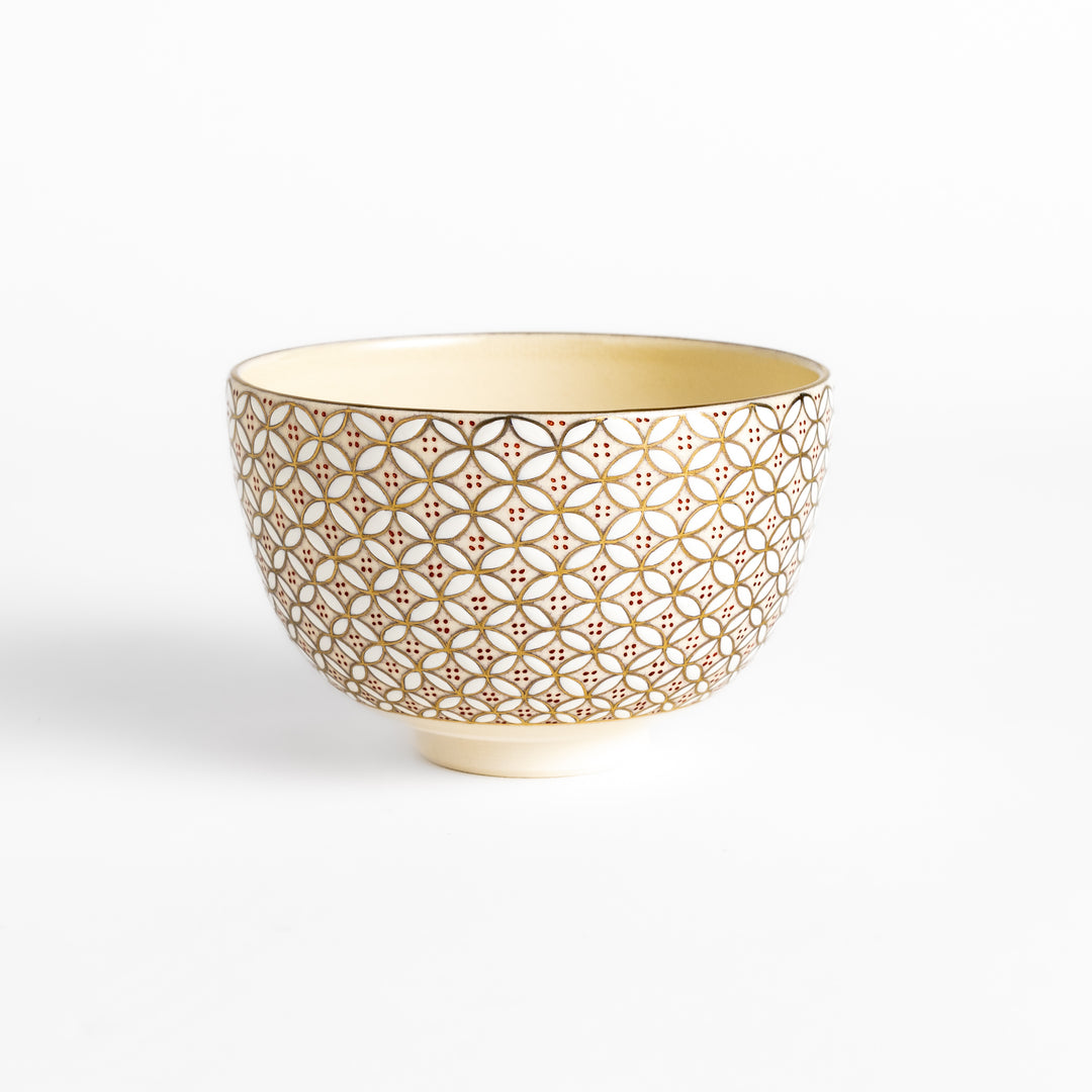 Golden Treasure Matcha Bowl with an intricate geometric pattern in gold and red, perfect for enjoying matcha in a stylish and traditional way.