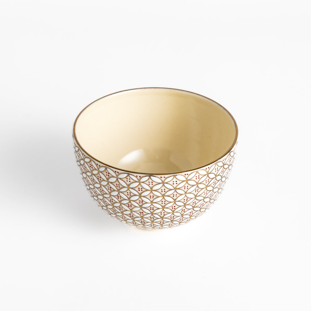 Golden Treasure Matcha Bowl with an intricate geometric pattern in gold and red, perfect for enjoying matcha in a stylish and traditional way.