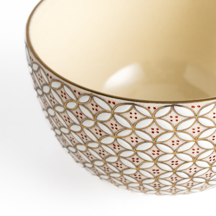 Golden Treasure Matcha Bowl with an intricate geometric pattern in gold and red, perfect for enjoying matcha in a stylish and traditional way.