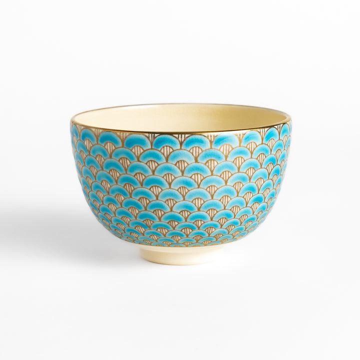 Golden Wave Matcha Bowl with a vibrant blue and gold fan pattern, featuring a smooth interior and perfect for serving matcha in style.