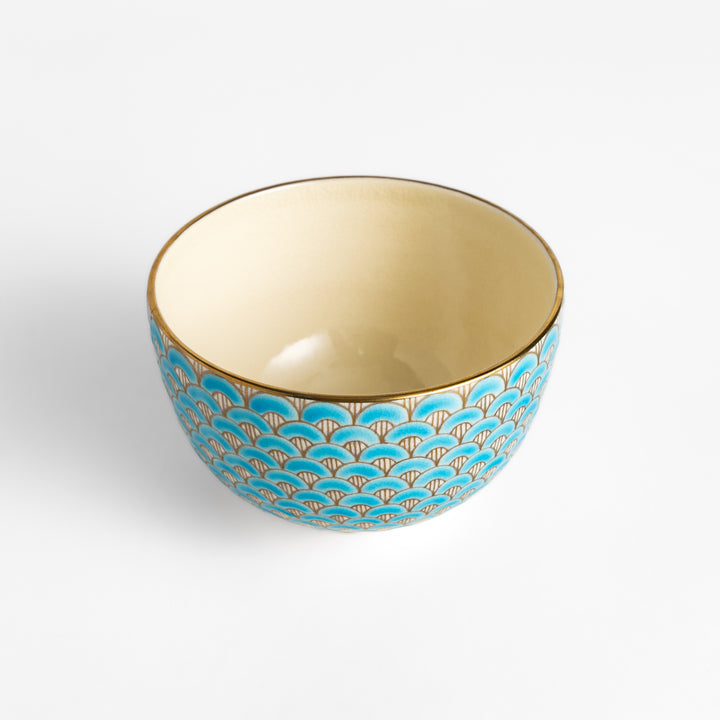 Golden Wave Matcha Bowl with a vibrant blue and gold fan pattern, featuring a smooth interior and perfect for serving matcha in style.