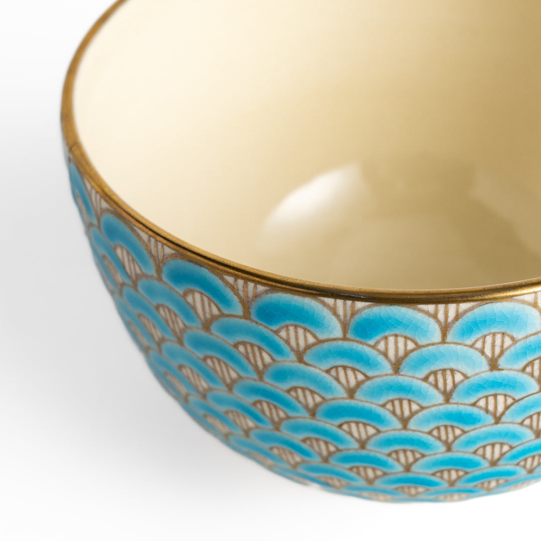 Golden Wave Matcha Bowl with a vibrant blue and gold fan pattern, featuring a smooth interior and perfect for serving matcha in style.