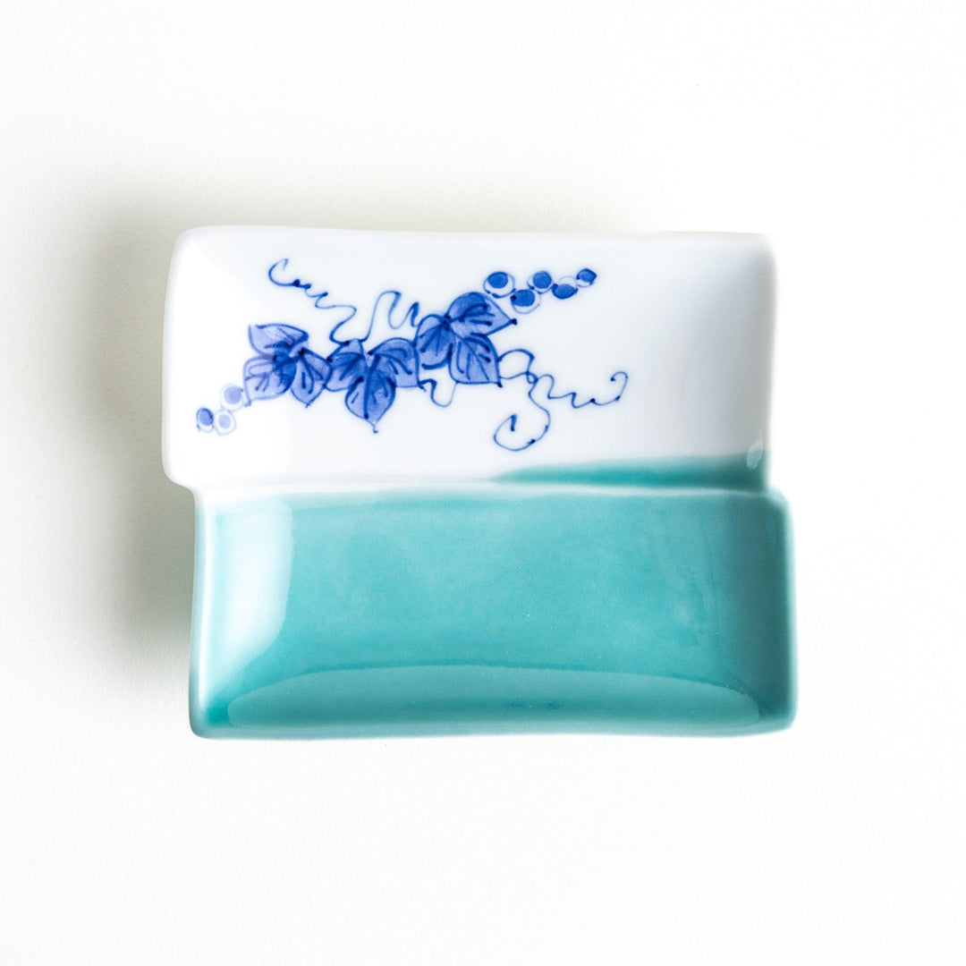 Rectangular plate with a blue floral grapevine design.