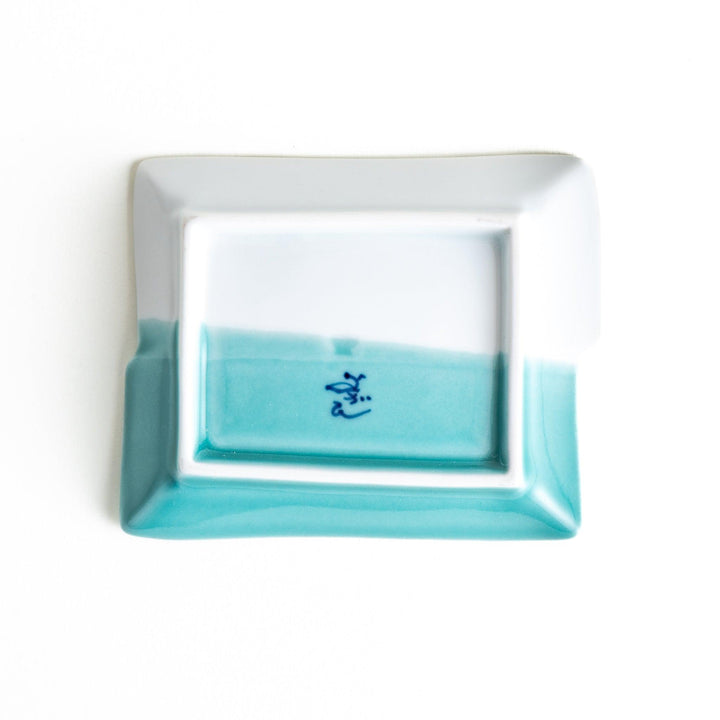 Rectangular plate with a blue floral grapevine design.