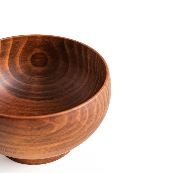 Detailed shot of the inner surface of the beechwood bowl, showing the intricate wood grain patterns.