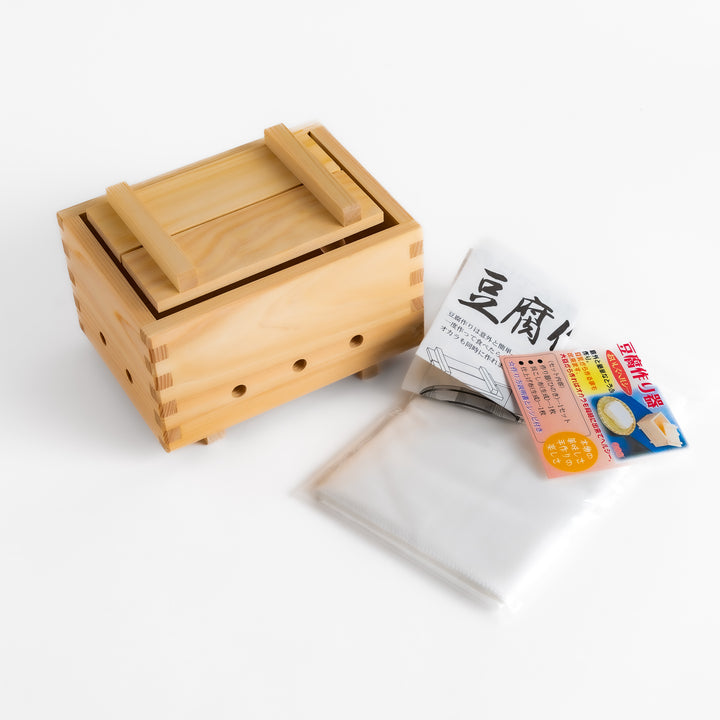 Hinoki Tofu Maker set, made of durable wood, includes tofu press, cloth, and instructions for homemade tofu.