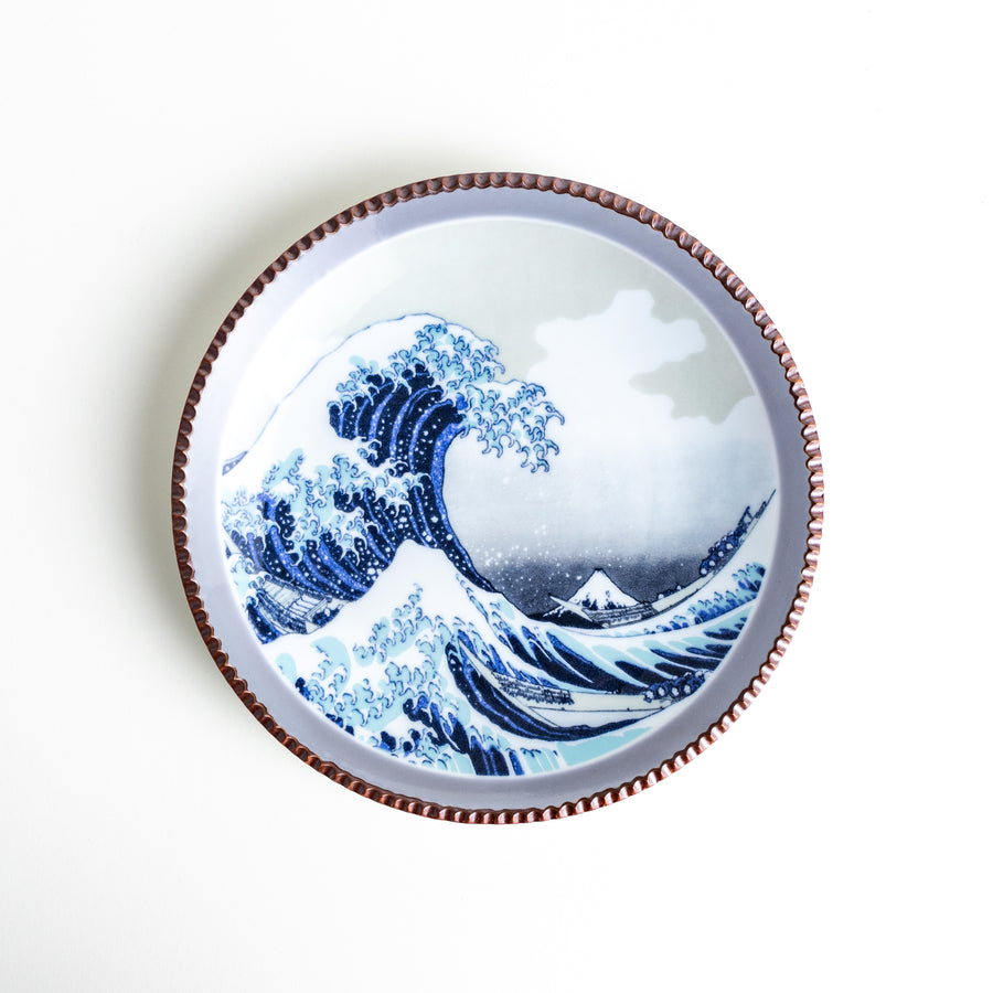 Ceramic salad plate featuring a classic image of The Great Wave off Kanagawa with a unique hammered copper rim.