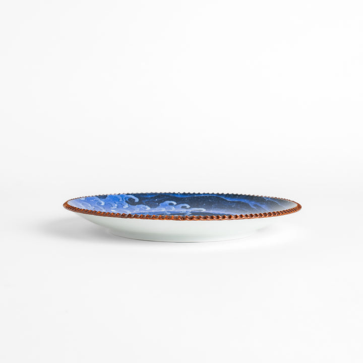 Beautiful ceramic salad plate, featuring a hand-painted Hokusai-inspired wave design, elevates any meal.