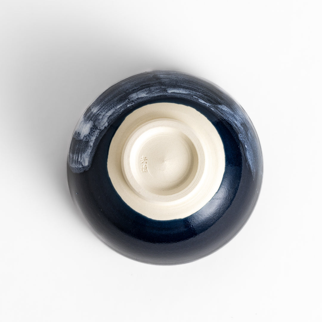 Artistic ceramic Matcha Bowl with a striking two-tone glaze and a rustic wabi-sabi feel.