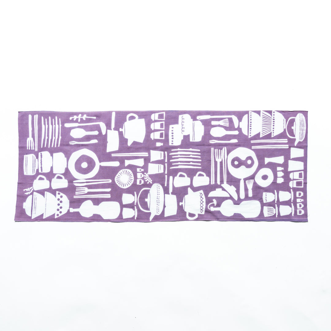 Purple tenugui hand towel fully opened, featuring white kitchenware designs like bowls, chopsticks, teapots, and utensils in a seamless pattern.