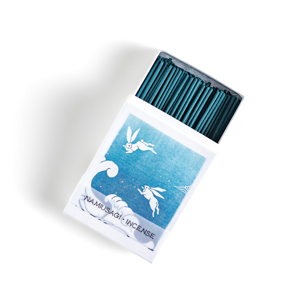 Incense with deep blue sticks, presented in a box featuring a traditional Japanese wave and rabbit design, offering a refreshing and calming fragrance.