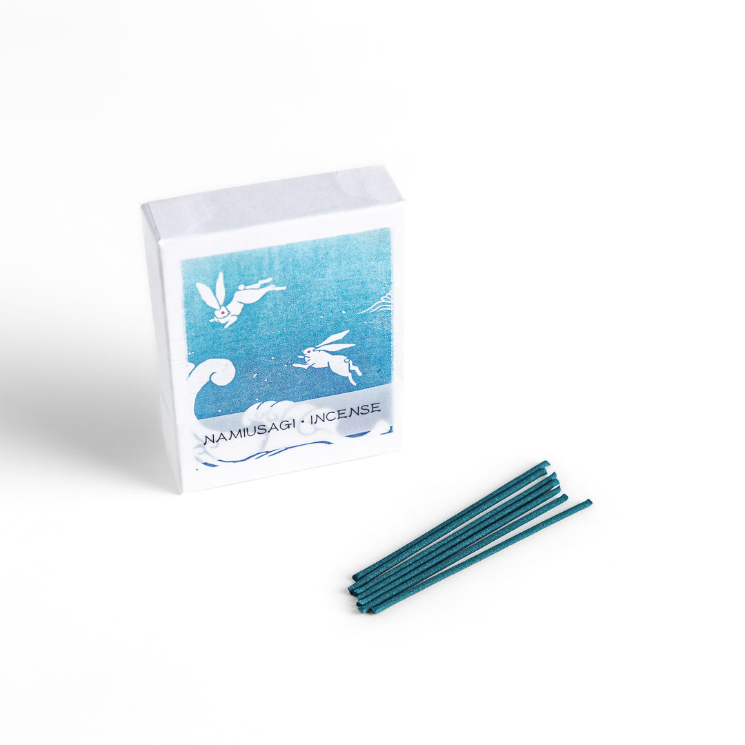 Incense with deep blue sticks, presented in a box featuring a traditional Japanese wave and rabbit design, offering a refreshing and calming fragrance.