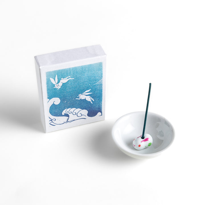 Incense with deep blue sticks, presented in a box featuring a traditional Japanese wave and rabbit design, offering a refreshing and calming fragrance.