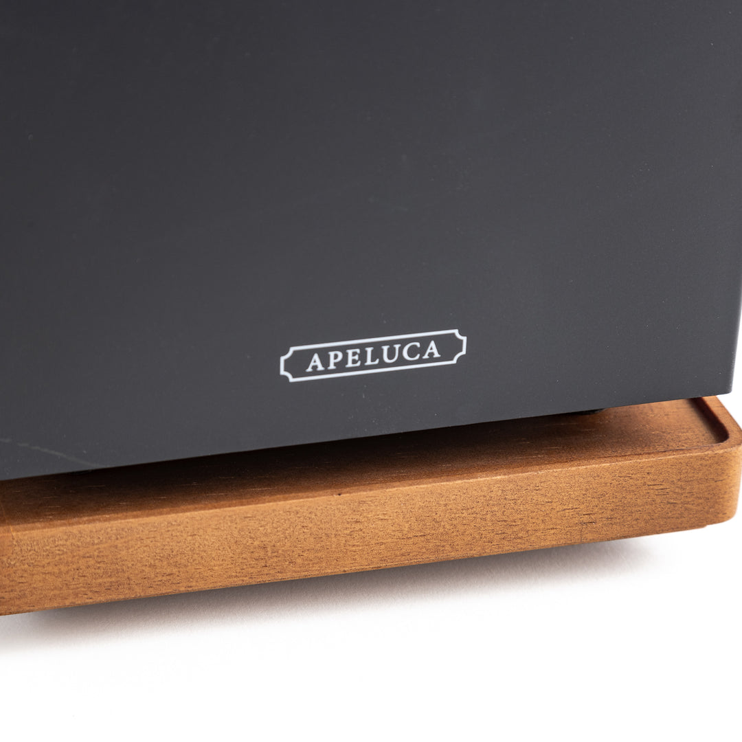 Close-up of luxe tabletop grill displaying the word "abeluca" on its front.