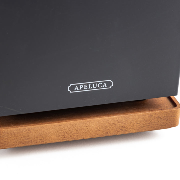 Close-up of luxe tabletop grill displaying the word "abeluca" on its front.