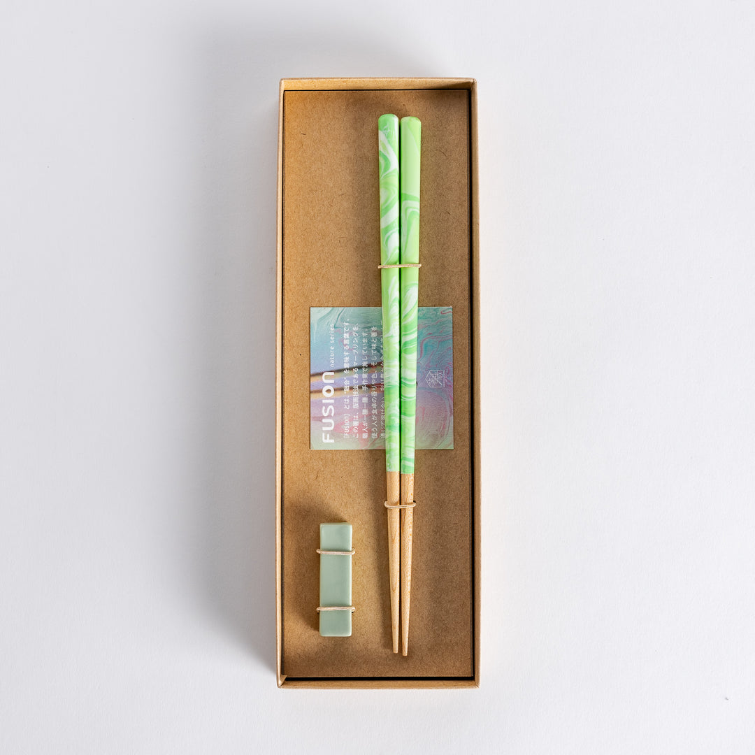 Chopsticks set in a beautifully designed package with lavender marbled chopsticks and soft-colored rest, a perfect gift.