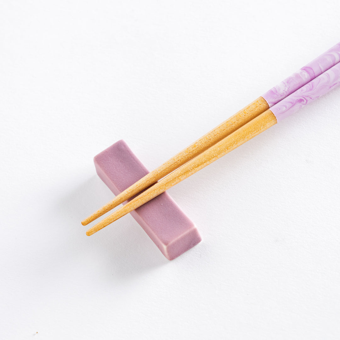 Lavender Breeze Fusion Chopsticks on a soft lavender rest, highlighting the beautiful design and functionality.