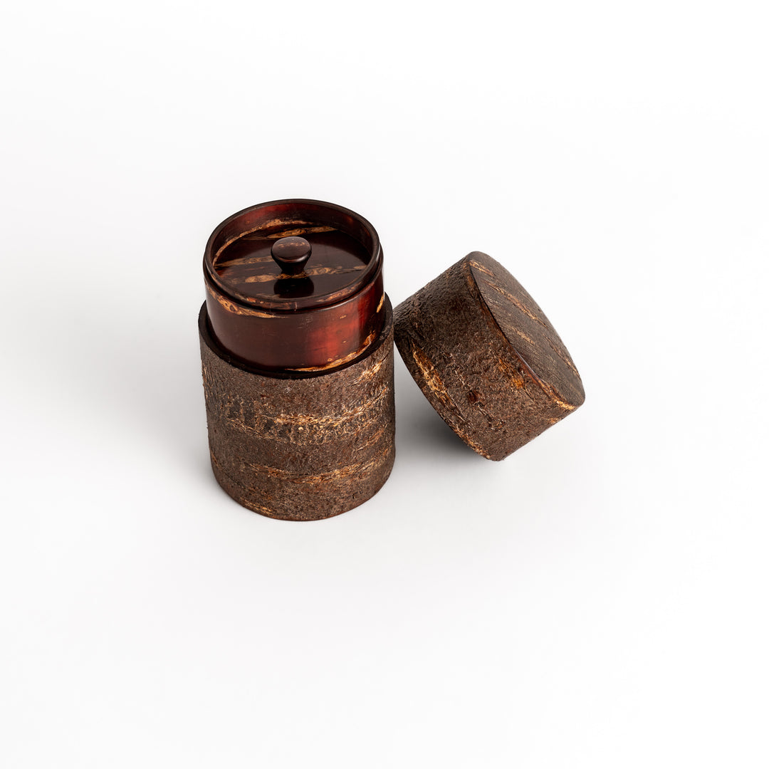 Rustic cherry bark tea canister with a deep brown finish and natural texture, perfect for storing and preserving loose leaf tea.