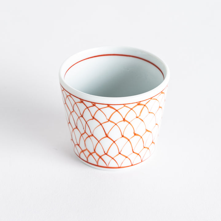 Small white condiment bowl with a blue mesh pattern.