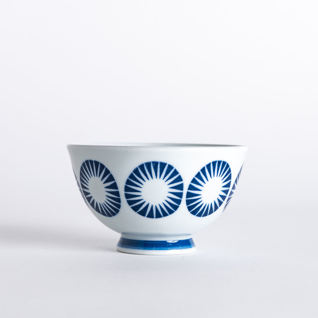 Modern Indigo Circle Rice Bowl from above, showcasing the navy blue radiating circle pattern around the bowl.