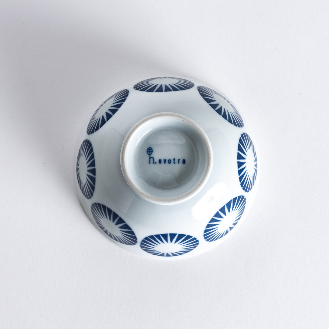 Bottom view of the Modern Indigo Circle Rice Bowl, showing the smooth white surface and blue base with no additional markings.