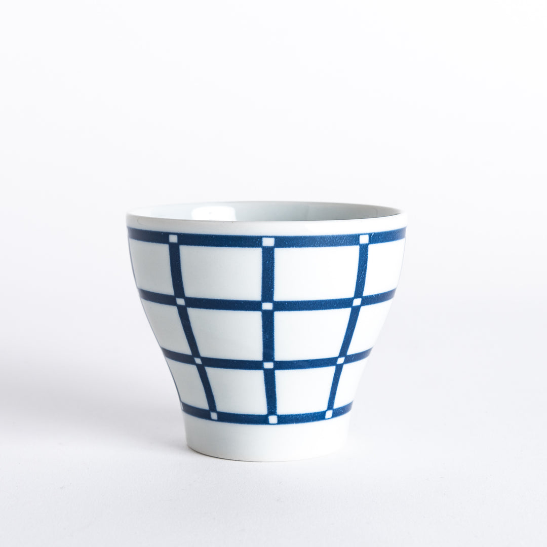 Side view of the Modern Indigo Lattice Cup, featuring the navy blue grid design that wraps around the cup.