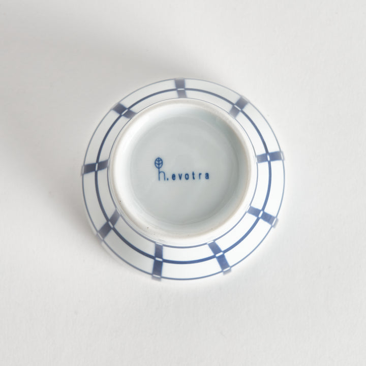 Bottom view of the Modern Indigo Lattice Cup, highlighting the base and showing the kiln maker's mark.