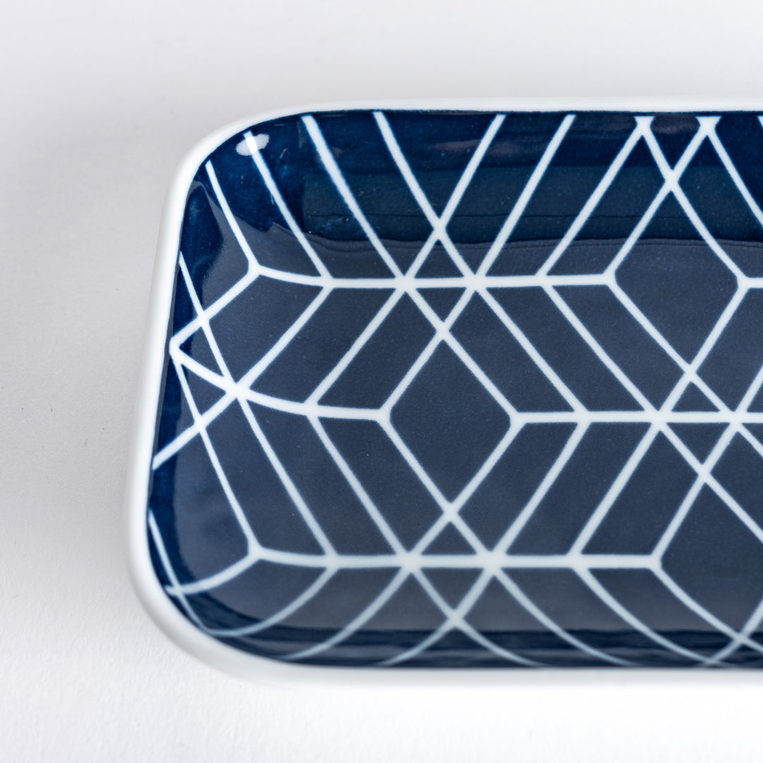 Close-up of the Modern Indigo Tile Dessert Plate, focusing on the intricate geometric design in navy blue.