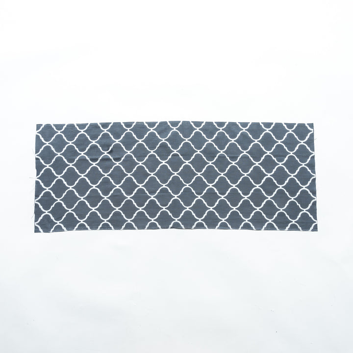 Moroccan tile-patterned gray tenugui hand towel laid flat, showcasing its full design.