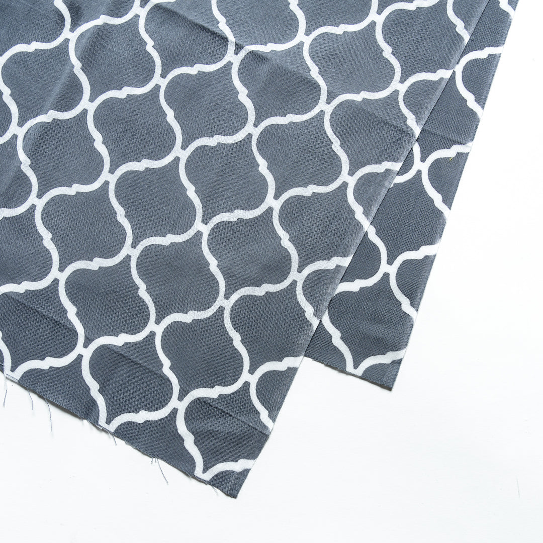 Close-up view of the white lattice pattern on the sophisticated gray tenugui hand towel.