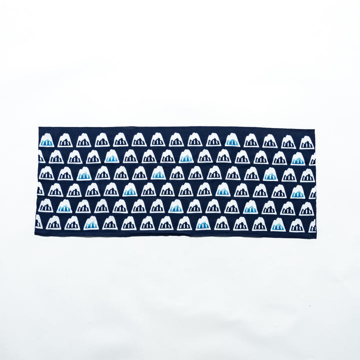 Fully spread navy blue tenugui showcasing alternating white and blue Mount Fuji patterns.