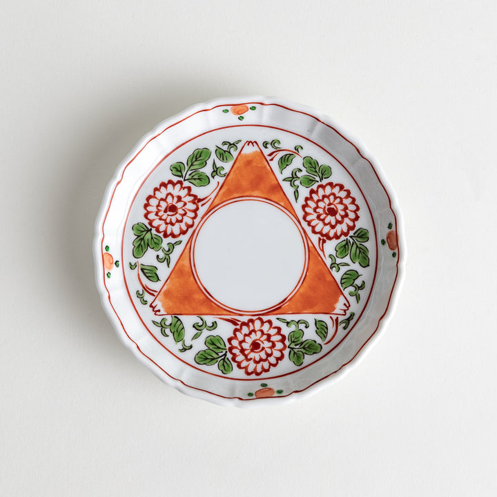 A dessert plate featuring a vibrant chrysanthemum and foliage design with an orange triangular motif encircling the center.