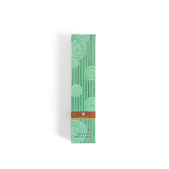 Mystic Camphor Incense in a light wooden box with deep green sticks, elegantly packaged in a soft green design featuring white circular patterns, evoking a refreshing and invigorating camphor aroma.