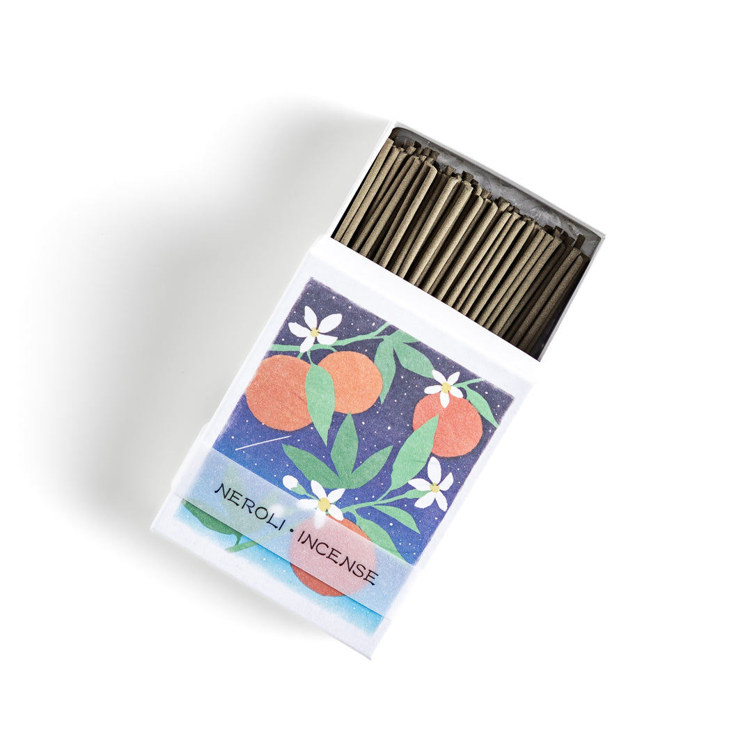 Incense featuring natural-toned sticks in a box adorned with an elegant illustration of neroli flowers and oranges, offering a citrusy and refreshing fragrance.