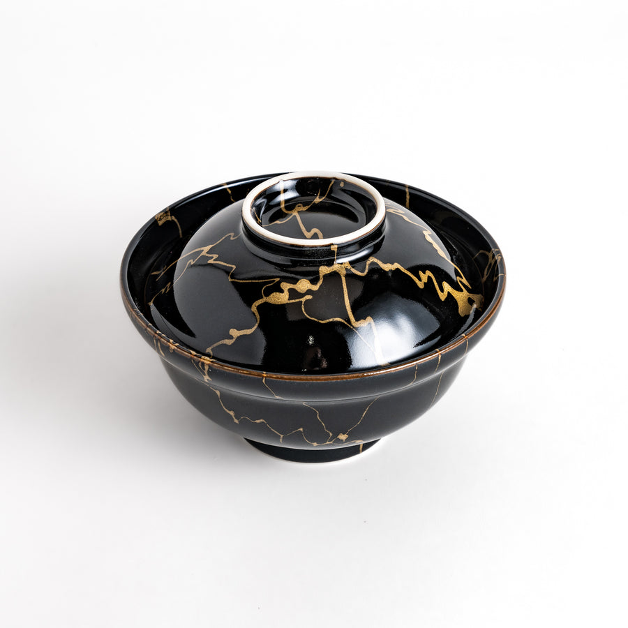 Black ceramic donburi bowl with a striking gold marbled design and a matching lid, perfect for serving and enjoying a variety of Japanese rice dishes."