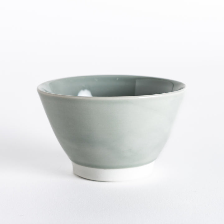 Pastel gray dessert bowl, viewed from the front, with a smooth ceramic surface and soft neutral tone.